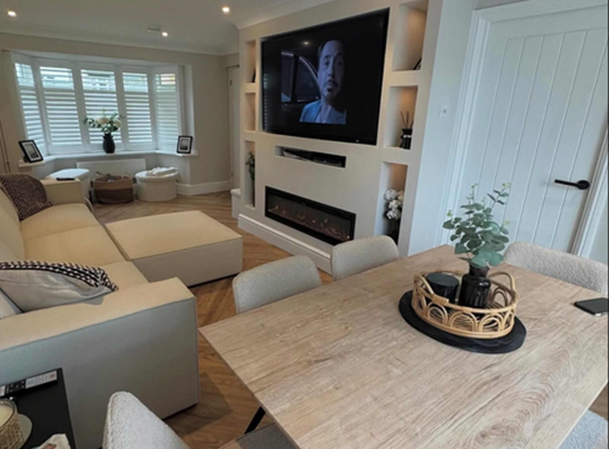 Modern living room with TV and fireplace