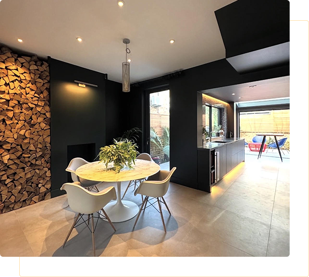 Modern dining area with stacked firewood wall